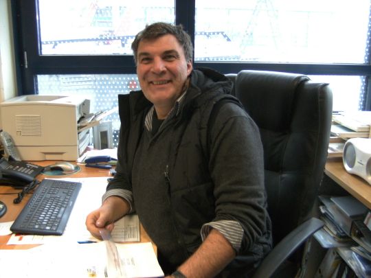 company owner in office